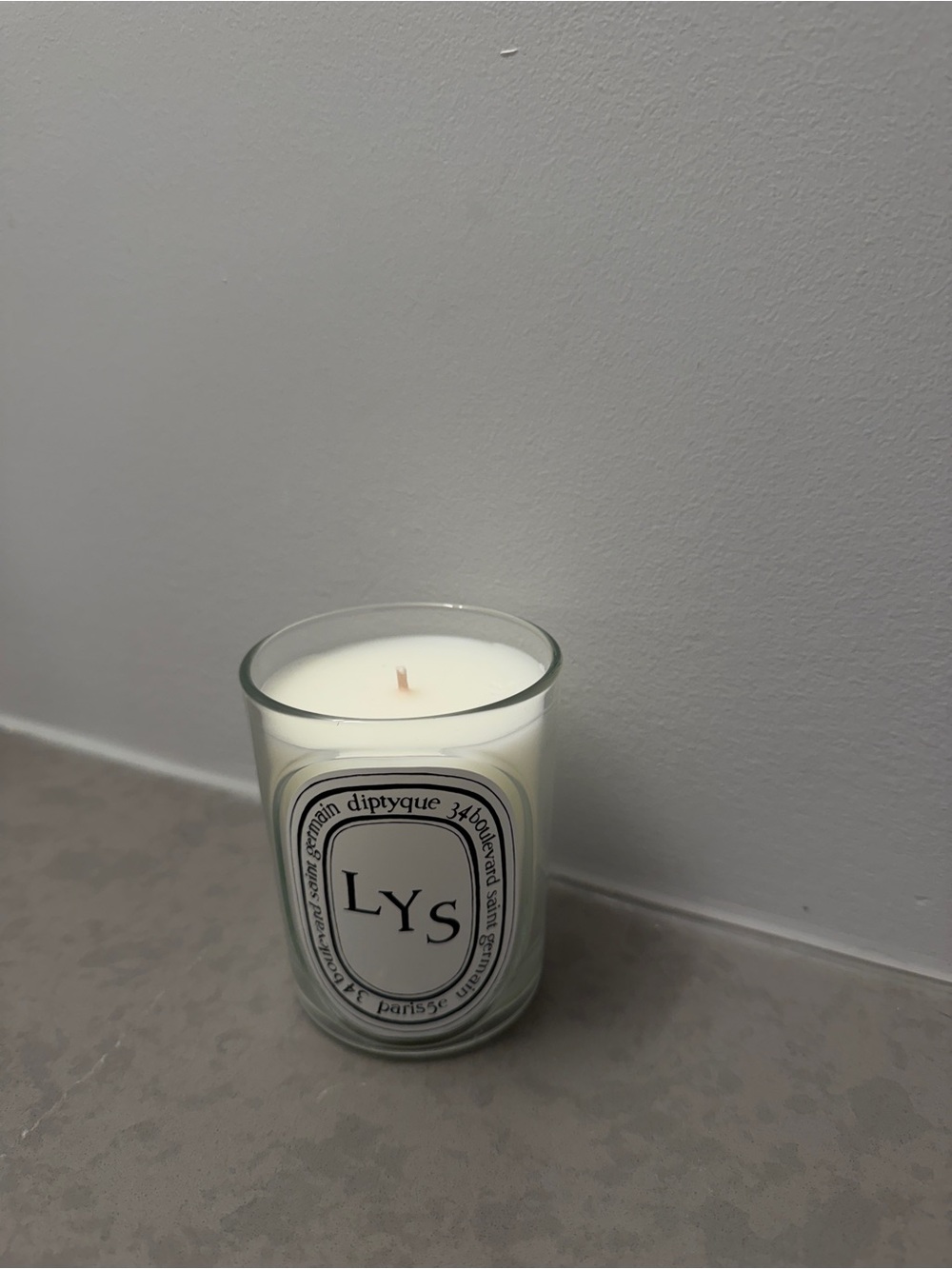 diptyque LYS Candle in Clear Glass with White Wax